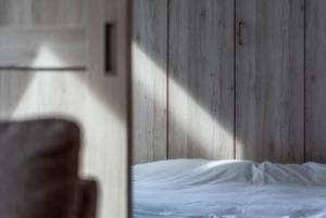 Llit o llits en una habitació de 札幌白色戀人巧克力觀光工場旁四房二衛浴包棟別墅！宮之澤地鐵站步行三分鐘 靠近超市 高速Wi-Fi