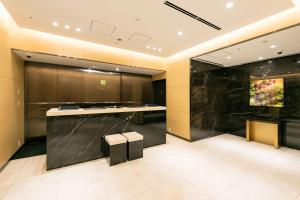 Vonios kambarys apgyvendinimo įstaigoje Ginza Capital Hotel Moegi