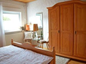 Ένα ή περισσότερα κρεβάτια σε δωμάτιο στο apartment Haus Renate Palatinate Forest