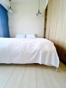 Снимка в галерията на Anping Nordic sea view three bedrooms в Тайнан