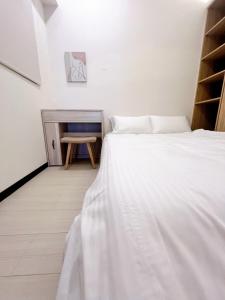 Снимка в галерията на Anping Nordic sea view three bedrooms в Тайнан