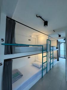 Postel nebo postele na pokoji v ubytování Canggu Central Hostel