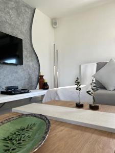 Televisyen dan/atau pusat hiburan di Relaxing home +37 gambar