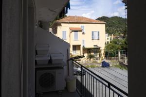 a view from a balcony of a house at Casa Rattazzi by Wonderful Italy in Albisola Superiore