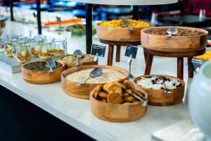 a display of different types of food in wooden baskets at ProfilHotels Richmond in Copenhagen