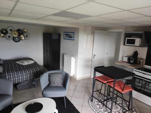 Kuchyň nebo kuchyňský kout v ubytování Appartement Logis Hippolyte