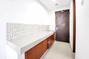 Φωτογραφία από το άλμπουμ του RedLiving Apartemen Enviro - Aurora Rooms σε Cibeber +26 φωτογραφίες