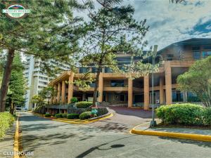 an empty street in front of a building at Canyon Woods Resort Club Tagaytay in Tagaytay