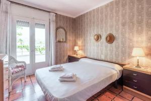 Postel nebo postele na pokoji v ubytování Port Llançà 31 - apartamento con vistas al mar