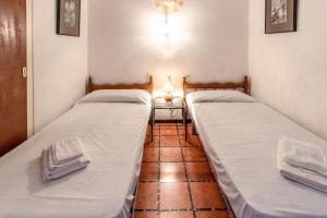 Postel nebo postele na pokoji v ubytování Port Llançà 31 - apartamento con vistas al mar