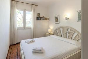 Postel nebo postele na pokoji v ubytování Port Llançà 31 - apartamento con vistas al mar
