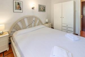Postel nebo postele na pokoji v ubytování Port Llançà 31 - apartamento con vistas al mar