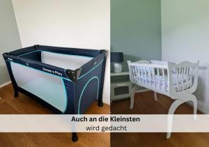 a blue baby crib sitting next to a table at Ferienhausträume Oase Bodensee in Kreuzlingen