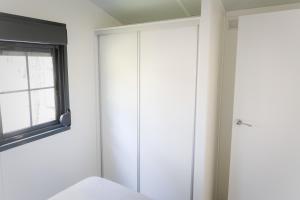 Postel nebo postele na pokoji v ubytování Camping Urbion