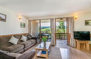 Televiisor ja/või meelelahutuskeskus majutusasutuses Laburnum Lodge sleeps 6 wheelchair access