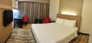 Letto o letti in una camera di Harbour View Hotel