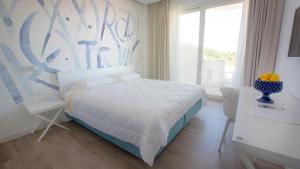 Letto o letti in una camera di Rodi Resort