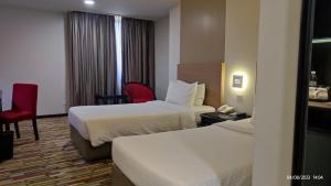 Letto o letti in una camera di Harbour View Hotel