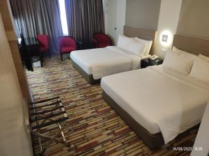 Letto o letti in una camera di Harbour View Hotel