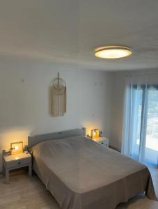 Ένα ή περισσότερα κρεβάτια σε δωμάτιο στο The Olive House