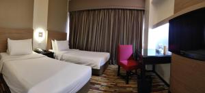 Letto o letti in una camera di Harbour View Hotel