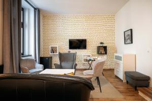 TV a/nebo společenská místnost v ubytování Bohem Prague Hotel