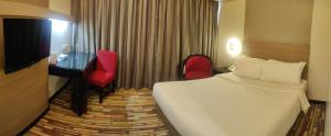 Letto o letti in una camera di Harbour View Hotel