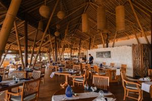 Restaurace v ubytování Jimbaran Puri, A Belmond Hotel, Bali