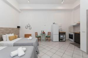 Kuchyň nebo kuchyňský kout v ubytování Dora's Apartments