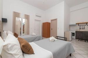 Kuchyň nebo kuchyňský kout v ubytování Dora's Apartments