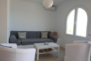 Posezení v ubytování CasaMarga San José Precioso apartamento con piscina y vistas al mar