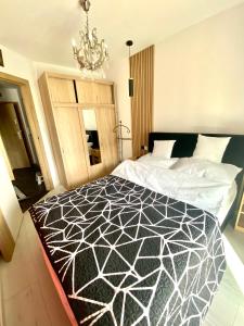 Postel nebo postele na pokoji v ubytování Apartament Komfortowy - Basen - Perłowa Przystań