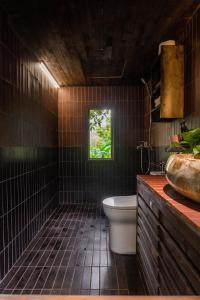 Een badkamer bij XIEM HOMESTAY
