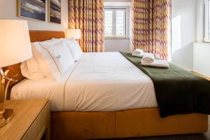 Ліжко або ліжка в номері Comtesse Lisbonne Guest House by Homing