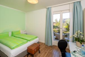 Postelja oz. postelje v sobi nastanitve Hotel Garni dei fiori