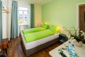 Postelja oz. postelje v sobi nastanitve Hotel Garni dei fiori