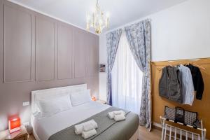 Letto o letti in una camera di The Space Rooms