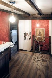 a room with a door leading to a bedroom at casa rural O lar do San Paio in Erboedo
