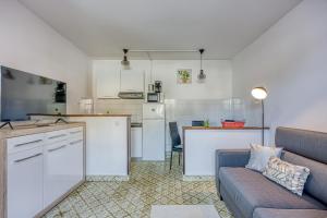 Kuchyň nebo kuchyňský kout v ubytování Apartment Riva 1001