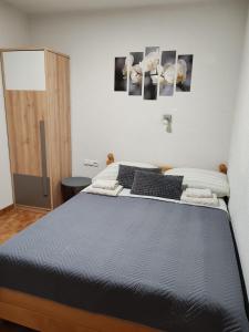 Postel nebo postele na pokoji v ubytování Rooms Marijanović Plitvice + 37 fotografií