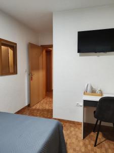 TV a/nebo společenská místnost v ubytování Rooms Marijanović Plitvice