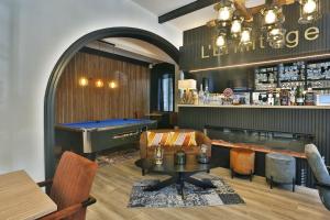 Лаундж або бар в Hotel L'ermitage