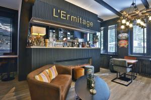 Лаундж або бар в Hotel L'ermitage