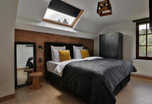 Ліжко або ліжка в номері Hotel L'ermitage