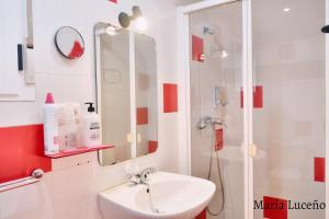 a bathroom with a sink and a shower at One bedroom apartement with furnished terrace and wifi at Caceres in Cáceres