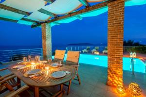 The swimming pool at or close to Iris Villas Lefkada - Karavi Villa with private sea access