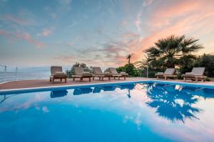 The swimming pool at or close to Iris Villas Lefkada - Karavi Villa with private sea access