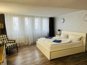Ein Bett oder Betten in einem Zimmer der Unterkunft The Burgklause Boutique Hotel
