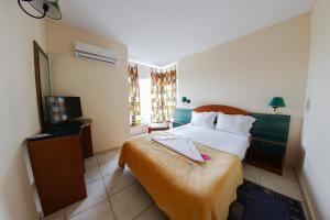 Postel nebo postele na pokoji v ubytování Hotel Majestic Olimp All Inclusive