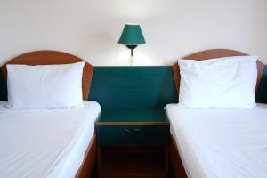 Postel nebo postele na pokoji v ubytování Hotel Majestic Olimp All Inclusive